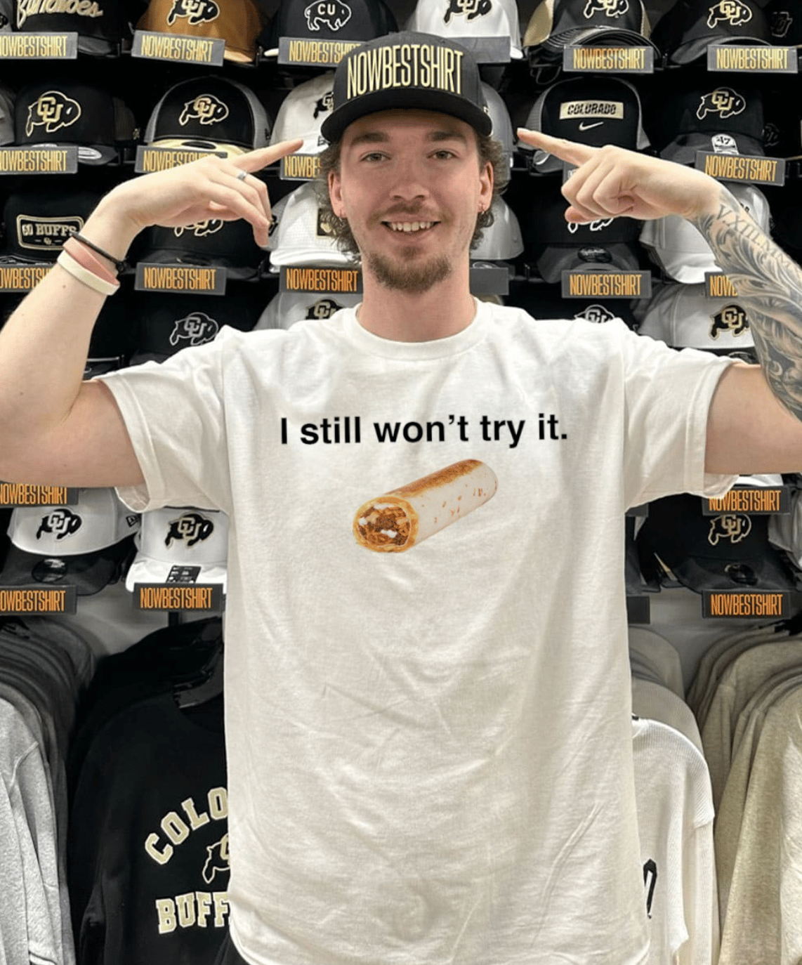 Image of someone wearing a knockoff t-shirt with a quesarito saying "I still won't try it"